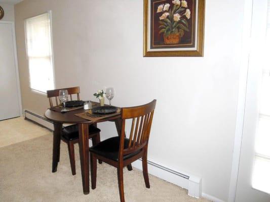 Dining area conveniently located off kitchen perfect for pub or bistro set!