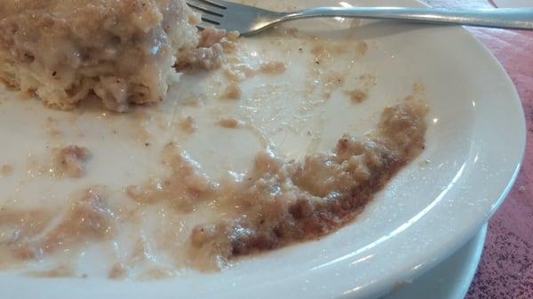 Burn marks on edges of gravy from 'nuking' (microwaving) YUK!  Biscuit was soggy & this plate was NASTY.  Should've refused it!