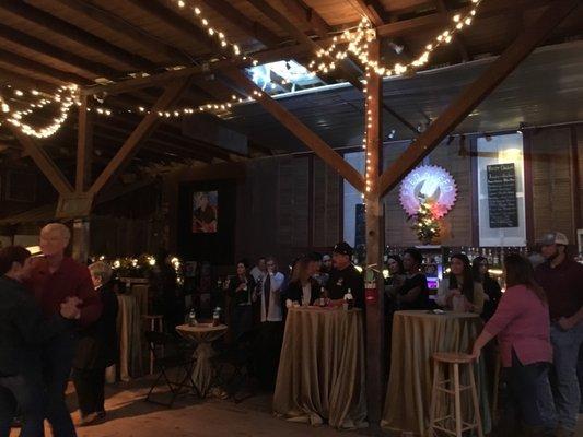 Tables and chairs around the dance floor