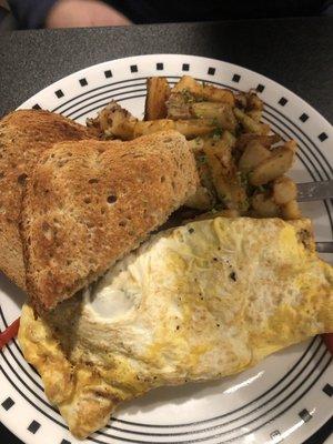 Omelet with peppers and onions. Breakfast potatoes and Rye toast.