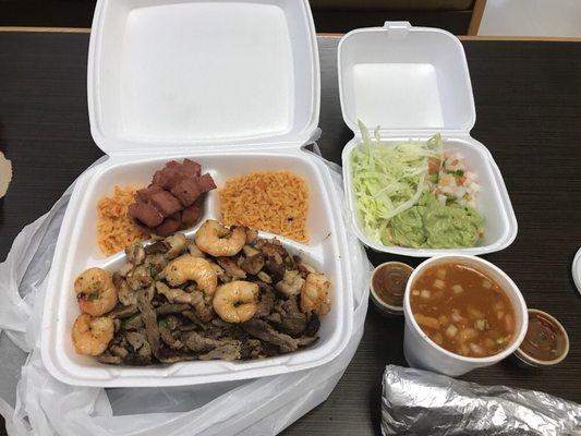 Parrilladas Supreme (Beef Fajita, Chicken Fajita, Shrimp, Sausage, Rice, Beans, Salad, Pico, Guac, and Corn Tortillas)