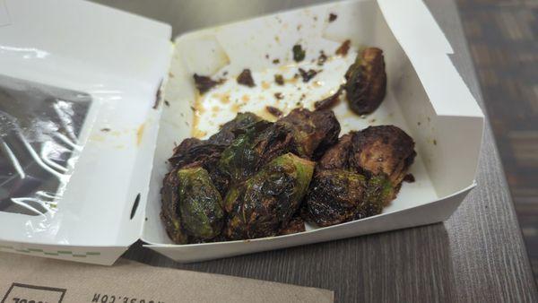 Brussel sprouts - sauce is sweet and spicy. They're served warm - my favorite part of the meal