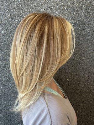 Blonde highlights on natural red hair.