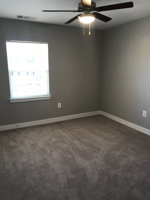 Wall-to-wall carpeting in bedrooms