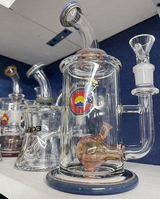 We have American glass!!! This is of our new borosilicate Glass Lab 303 waterpipes. Peep some others in the back!