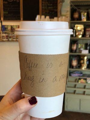 Cute little handwritten message on our coffee sleeves!