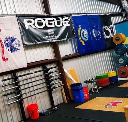 They have Premium Quality Olympic weightlifting platforms, weight, and bars!! OH MY!! LIGHTWEIGHT BABY!! This is a decked out Crossfit Box!!