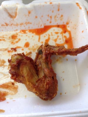 Chicken wing  looked like it was refried of couple of times