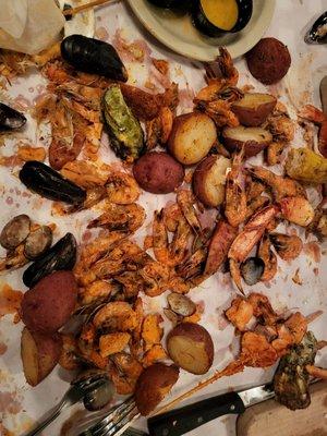 Clambake feast - lots of small shrimps, everything is dry and overcooked