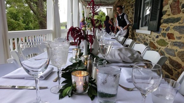 Our beautiful table setting on the back porch for our rehearsal dinner.