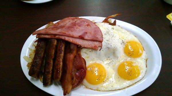 Big Man's Breakfast - 3 meats, 3 eggs, hash browns, with toast.