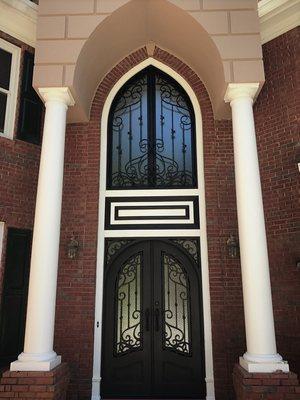 Custom Iron doors and matching palladium Iron window. These really bring the 'WOW" factor!