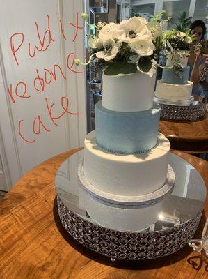 This is the cake at the venue after Publix fixed it with only the basic colors from the original inspiration picture