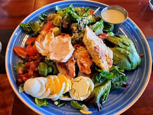 Cobb Salad-Fresh crunchy leaves,thick bacon bits, grape tomatoes,delicious green goddess dressing.Just Yummy!