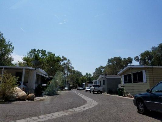 You drive through a mobile neighborhood to get to the shop.