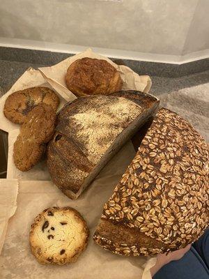 Sourdough Seeded 2 lb. Loaf, Chocolate Chip Sea Salt Cookie, Cranberry Pecan Shortbread Cookie, Pain au Chocolat