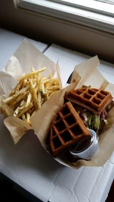 Pulled pork waffle sandwich and order or garlic fries