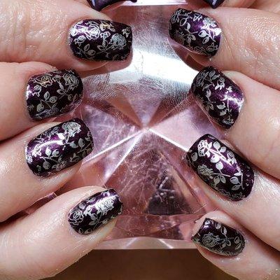 Deep plum polish with silver rose stamps!