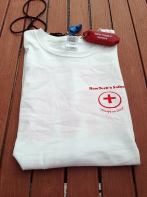 The latest creation for the lifeguard or swimmer in your life the front of our new "Shut up and Swim!" T-Shirt.