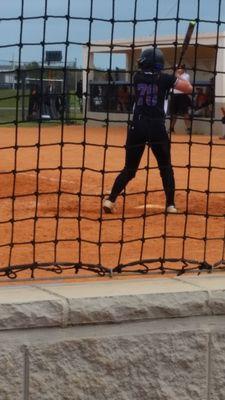 Niece playing softball