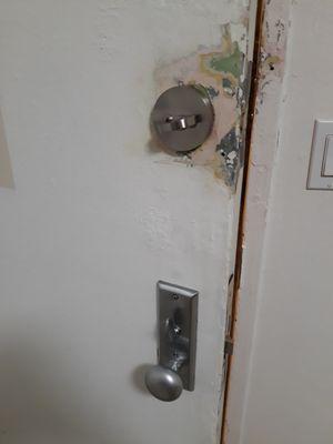 Two new locks installed.  The paint problems were there before installation.