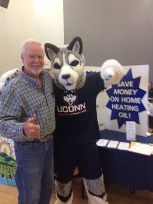 Co-op President Mark Hutson and Jonathan the UCONN Husky give a big thumbs up to the Co-op!