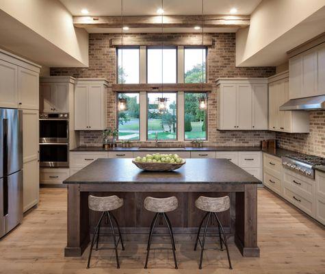 Thin brick accent walls make this kitchen the perfect space for gathering.