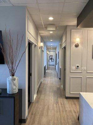 Our gracious hallway leads patients to the consultation room, xray room, toothbrush station, and our clinic for all of your treatment needs.