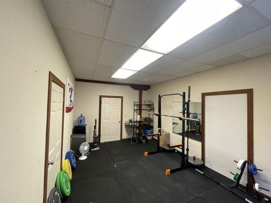 This is the current layout of the private gym. With a squat rack, weights, and resistance bands, we are able to work on whatever we need to