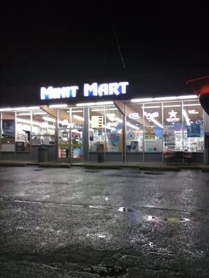 The front of the store at night