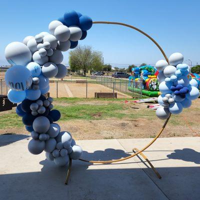 First birthday custom color balloons on gold round stand