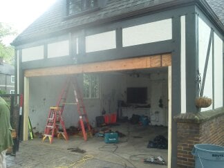 Garage door header replacement on historical home due to water damage