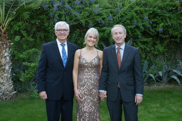 Parents of the bride with officiant