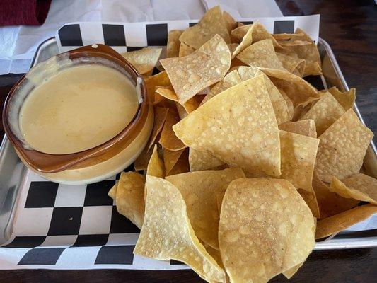 Chips and queso. They have two options, this is the milder one. Delicious!