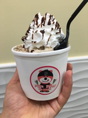 Chunky monkey with whipped cream and chocolate sauce toppings