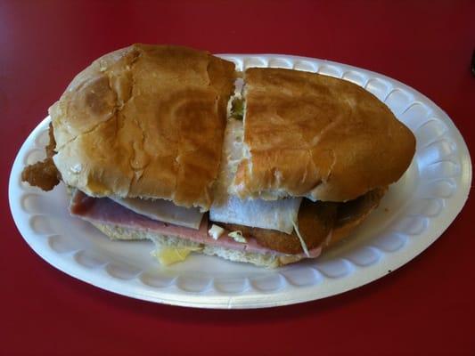 El Cubano: ham, chicken-fried steak, hot dogs, cheese, and refried beans