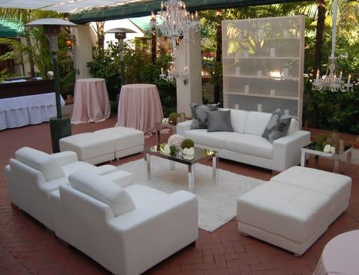 Elegant White Leather Furniture Set. Sofa, club chair, and ottoman available.