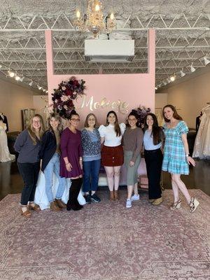 A picture of me with my mom and friends at Moliere Bridal after I showed them my wedding dress.