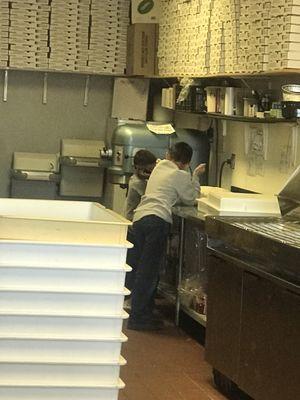 Children playing with dough.