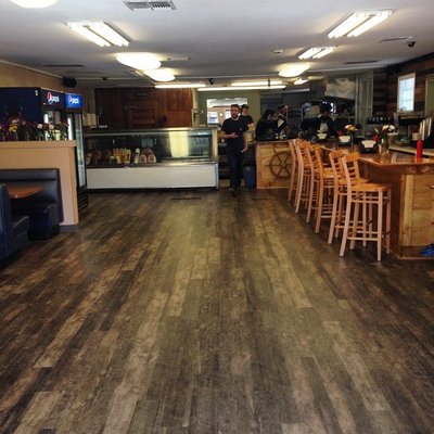 Shaw's floating vinyl plank for the Capsized Cafe in Spring Lake, NJ. Support your local businesses!