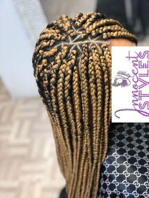 Triangle box braids at innocent hair braiding salon