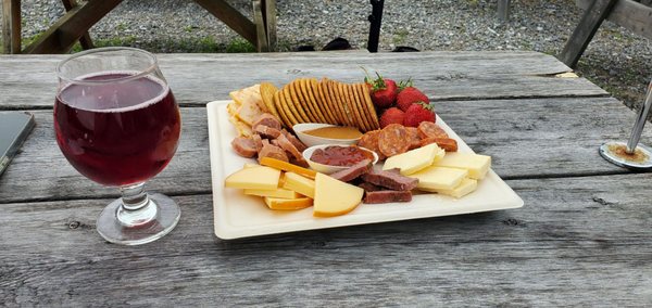 Cheese, crackers, meats and blueberry adult beverage.  Yum!