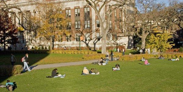 The perfect setting for outdoor learning: Students take advantage of the serene campus atmosphere."