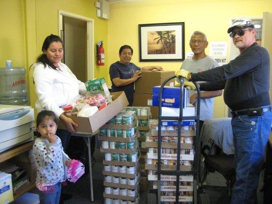 Family receiving food distribution