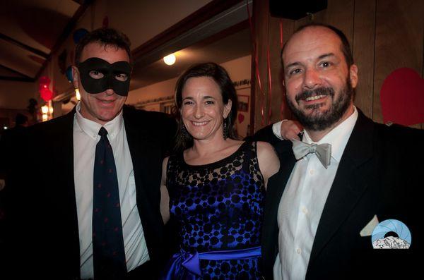 Owner Duncan Moore (far right), at a masquerade ball for a local Seattle charity.