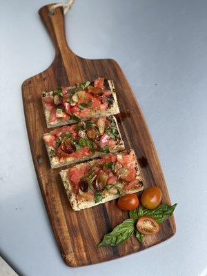 Bruschetta of diced Roma tomatoes, fresh basil, olive oil and roasted garlic