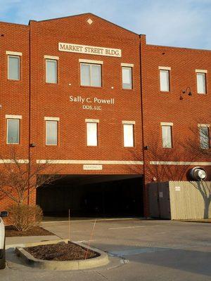 Behind the building there is a convenient parking garage that is right next to an elevator for easy access.