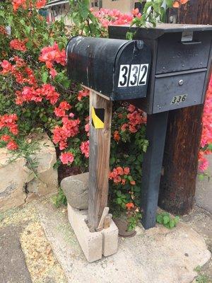 Broken mailbox tells you everything you need to know about how Jim upkeeps his property.