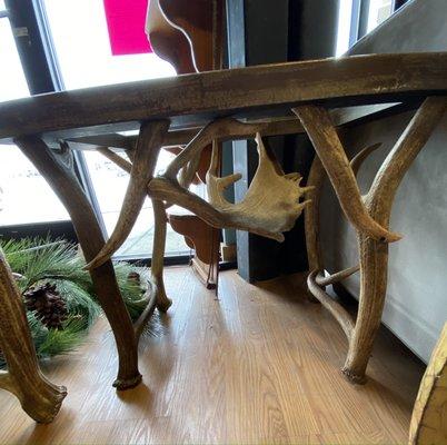 Handmade, unique real antler side table has matching sofa table.