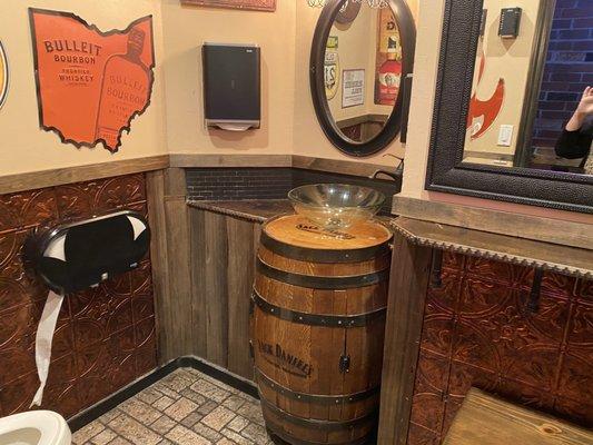 Women's restroom- love the Jack Daniels barrel sink